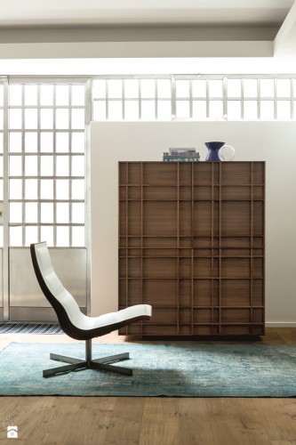 The Kilt Cabinet, with its geometric design in solid Canaletta walnut, is a beautiful addition to luxury Italian brand Porada’s extensive range of living room or dining room.