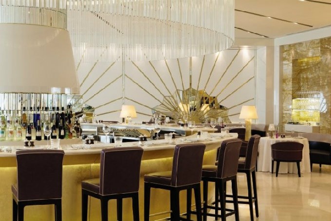 Oro Bar, Abu Dhabi, embellished with Gold Mosaic by Martin Brudnizki Design Studio.