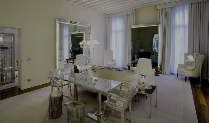 Philippe Starck – Hospitality project Palazzina Grassi in Venice. Beautiful white and silver hotel suite.